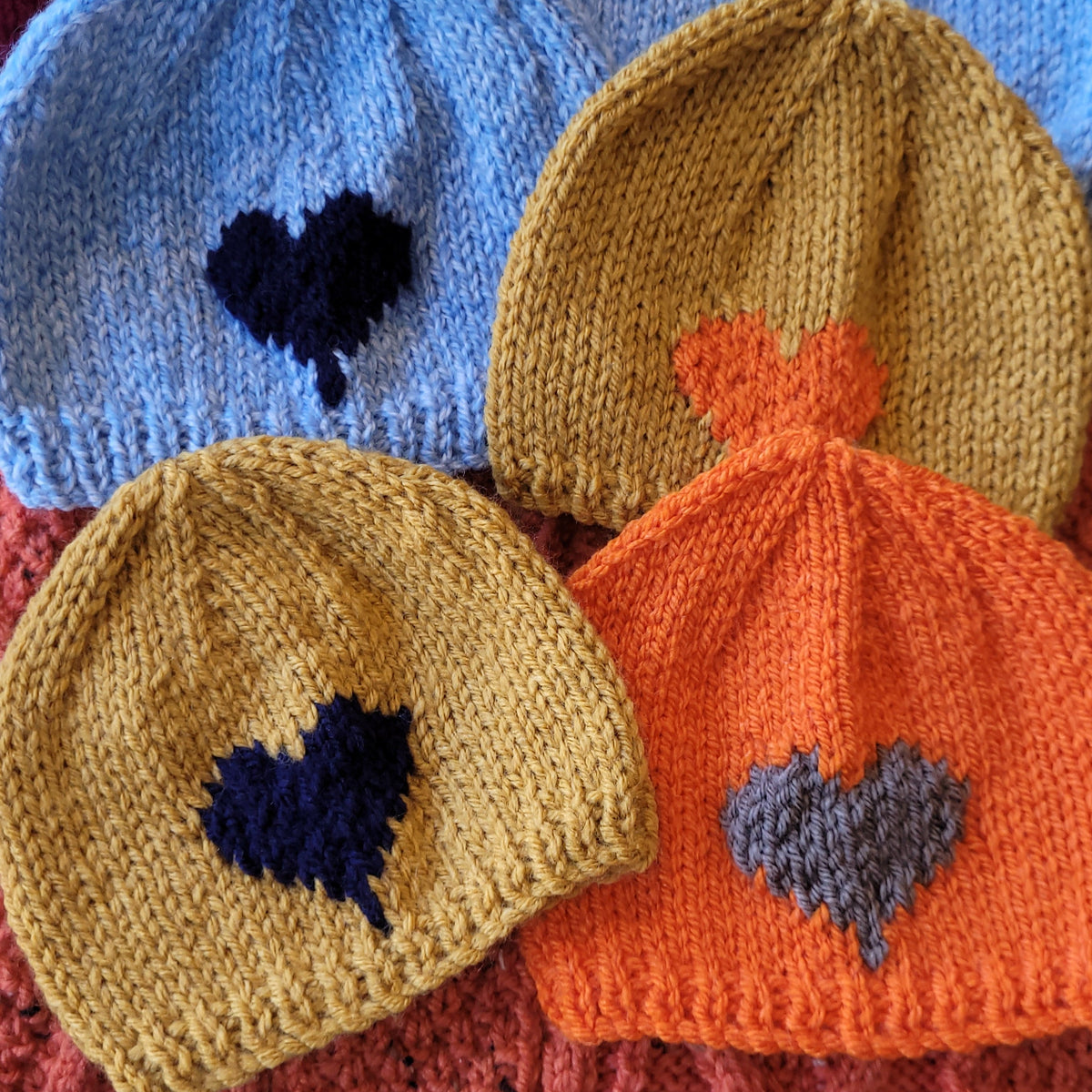 Hand knit baby hats